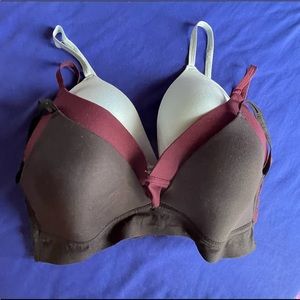 IZOD bra’s, no under wire, set of 3, black, light blue and burgundy size 36DD.